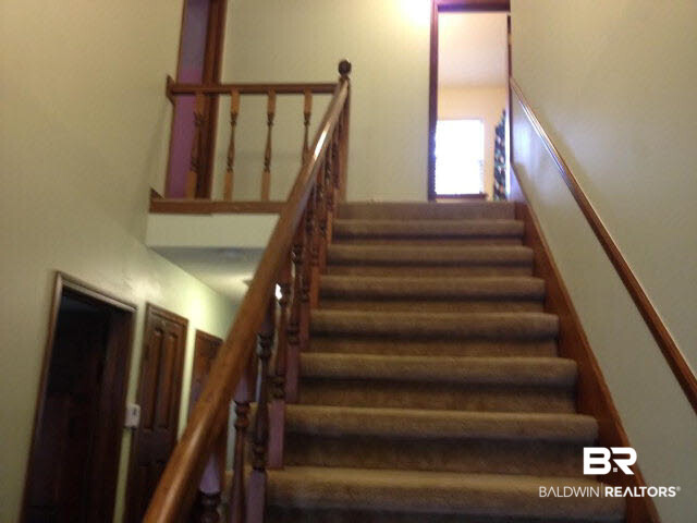 111 Woodside Drive Daphne, AL 36526 - Photo 17 of 31 Stairway to the upstairs bedrooms and bath