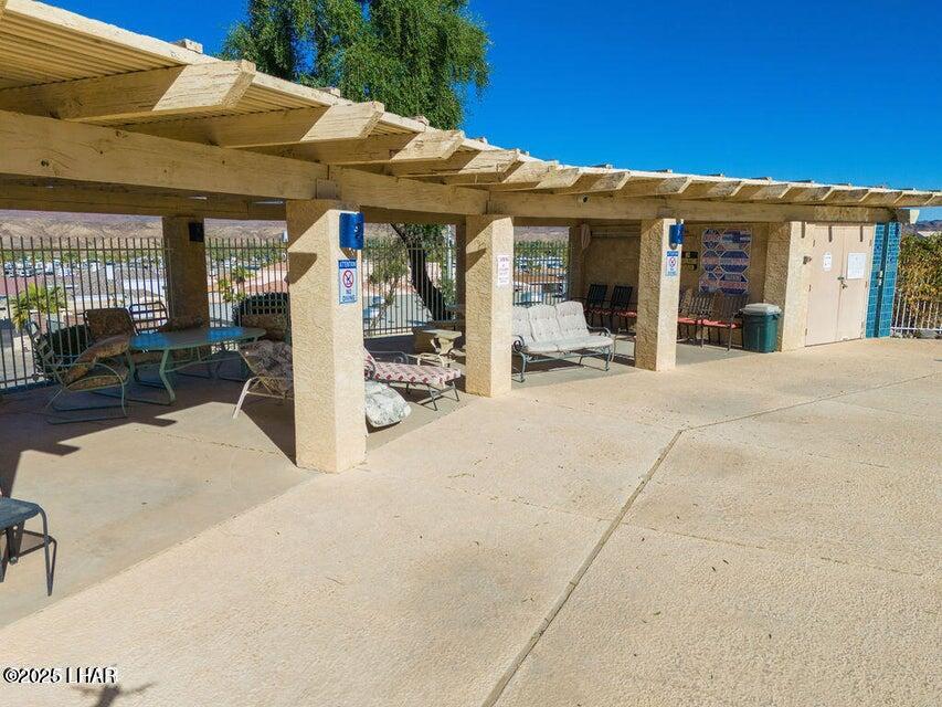8625 Riverside Drive, Unit 55 Parker, AZ 85344 - Photo 22 of 32 Covered Pool Lounge area