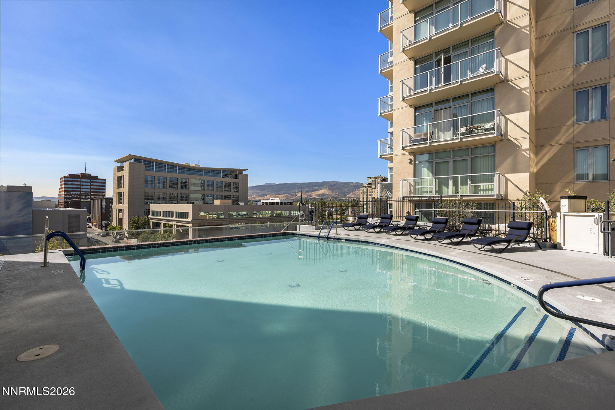 50 North Sierra Street, Unit 805 Reno, NV 89501 - Photo 20 of 23 a view of a swimming pool with outdoor seating