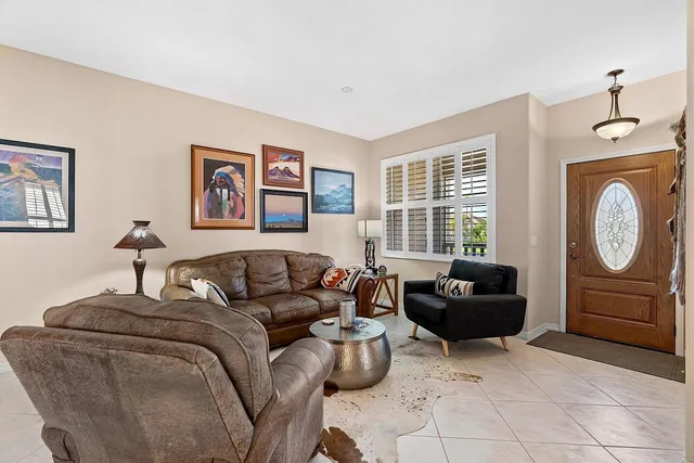 a living room with furniture and a couch