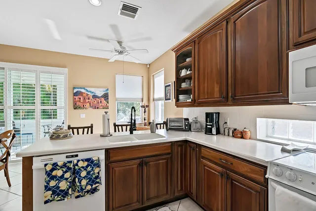 a view of a dining room with furniture