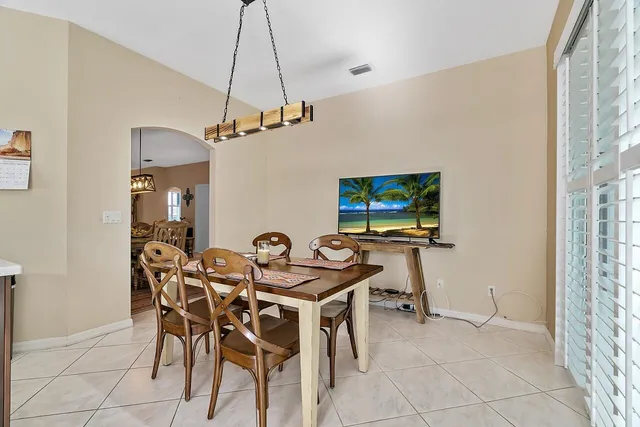 a view of a dining room with furniture