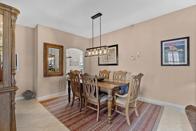 a bedroom with furniture and a flat screen tv