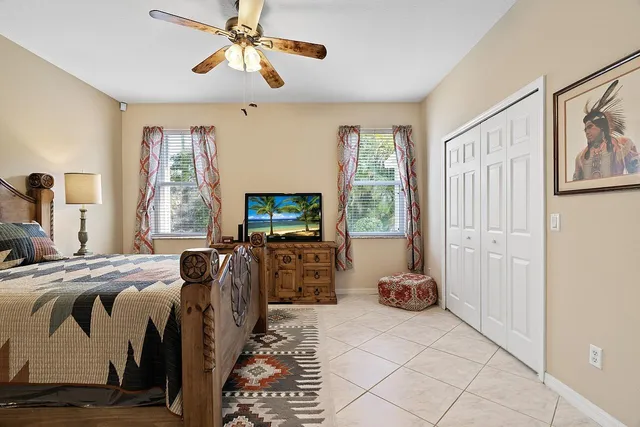 a bathroom with a sink a mirror and a vanity