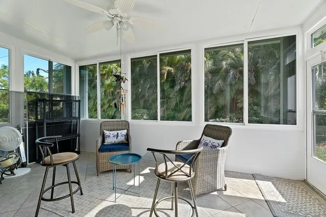 a view of a park with large trees