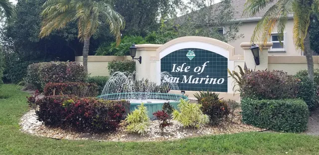 a front view of a house with a yard and porch