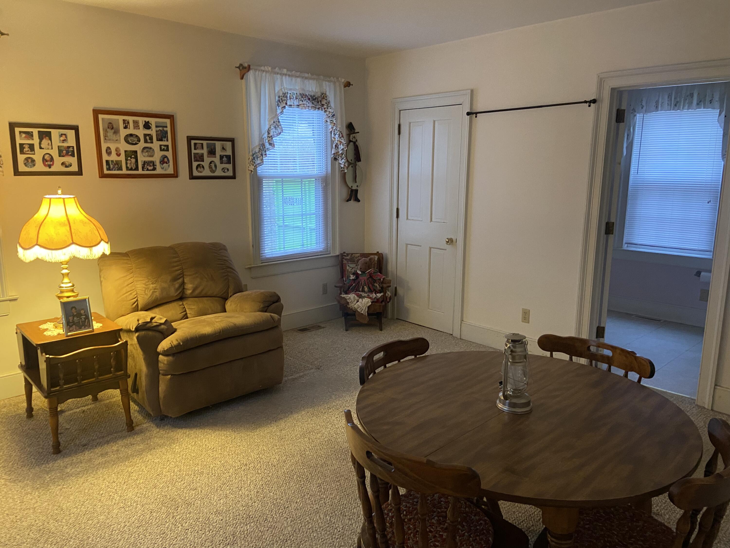 7229 Springwood Road Buchanan, VA 24066 - Photo 11 of 40 a living room with furniture and a table