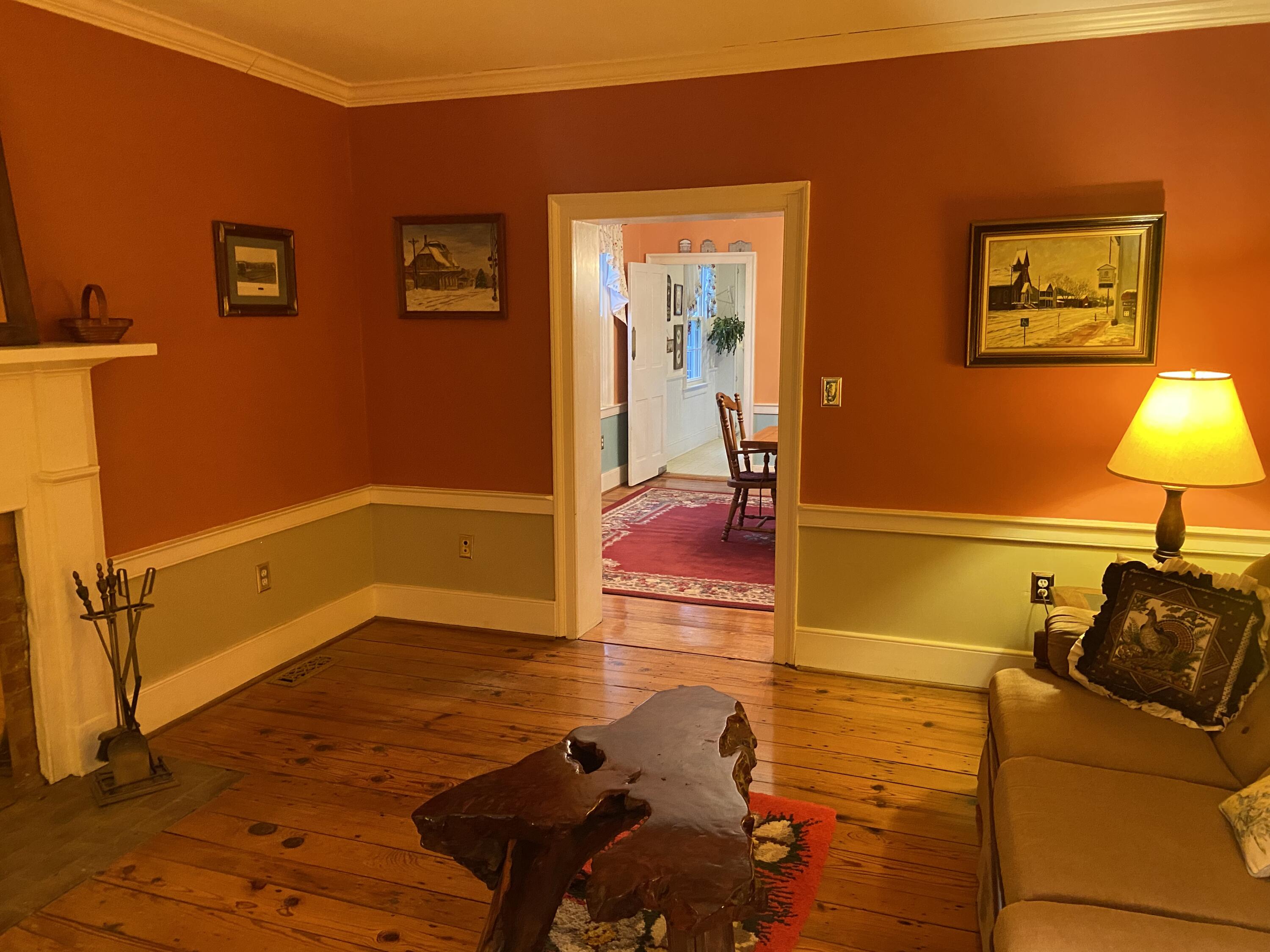 7229 Springwood Road Buchanan, VA 24066 - Photo 12 of 40 a living room with furniture and a lamp