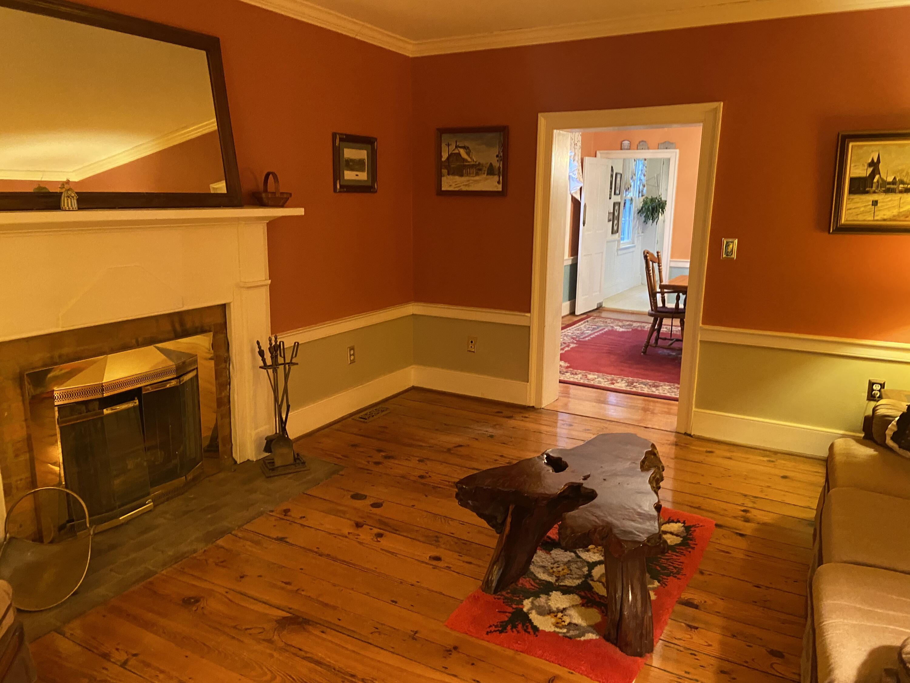 7229 Springwood Road Buchanan, VA 24066 - Photo 13 of 40 a living room with a couch and a fireplace