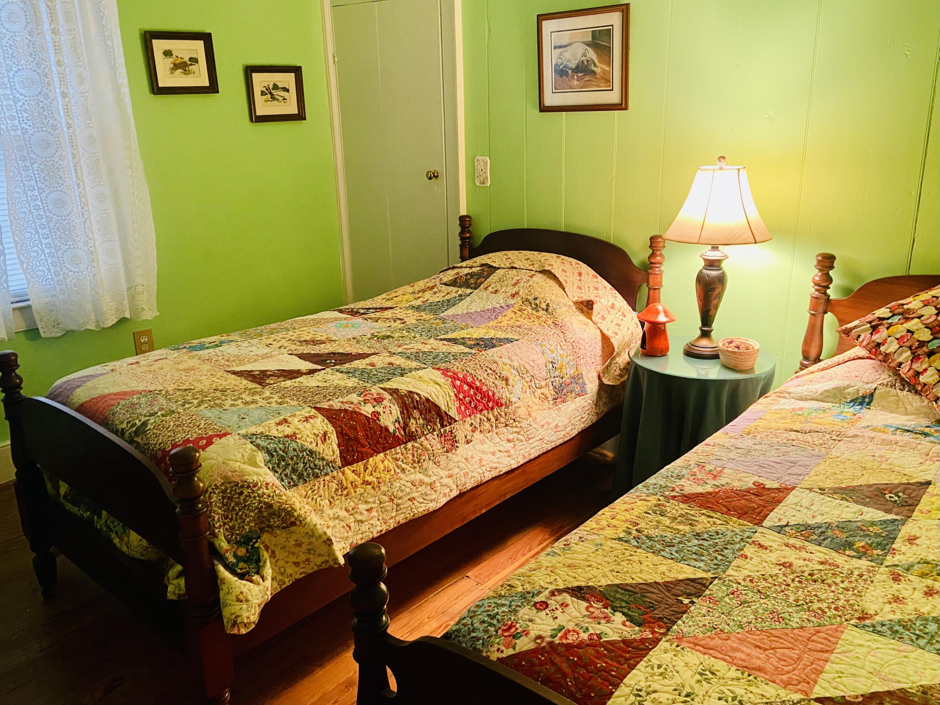 7229 Springwood Road Buchanan, VA 24066 - Photo 23 of 40 a bedroom with a bed and a painting on the wall