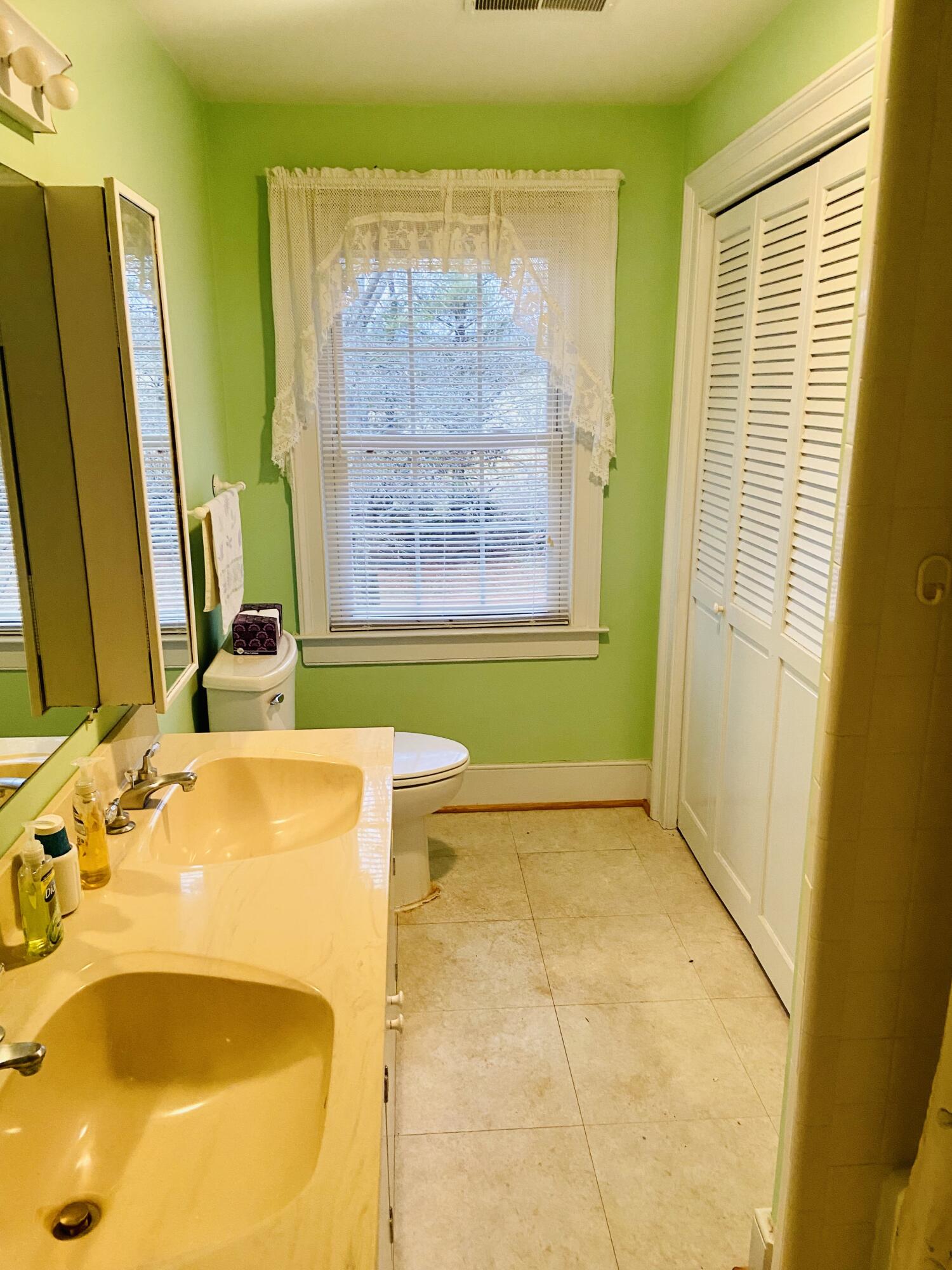 7229 Springwood Road Buchanan, VA 24066 - Photo 24 of 40 a bathroom with a tub sink and a mirror