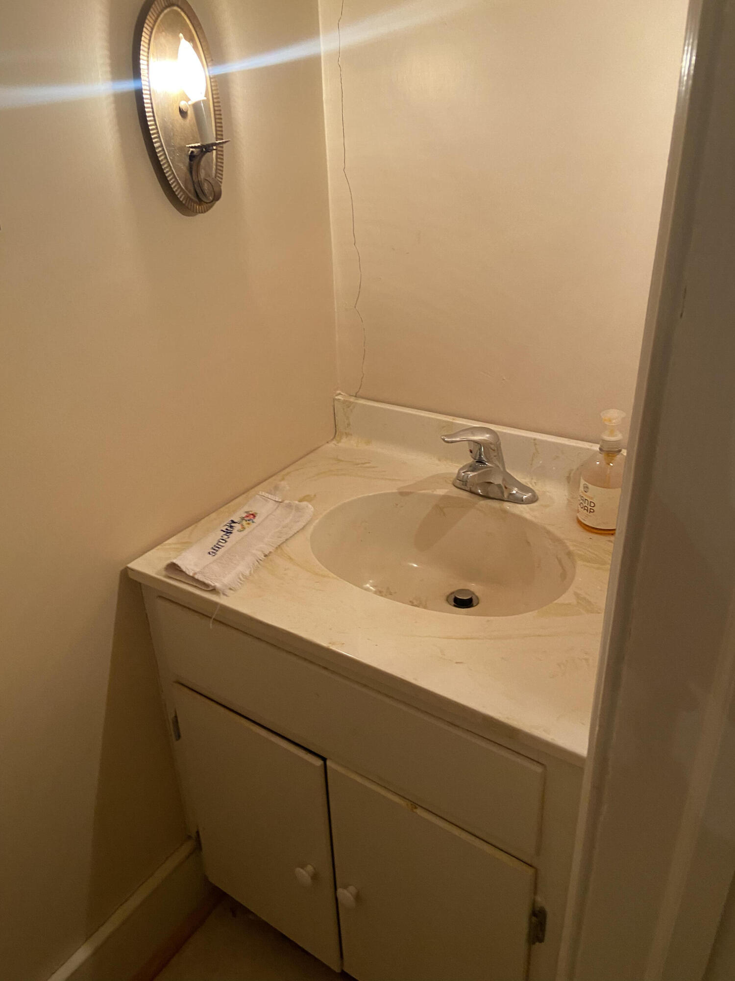 7229 Springwood Road Buchanan, VA 24066 - Photo 26 of 40 a bathroom with a sink and cabinets