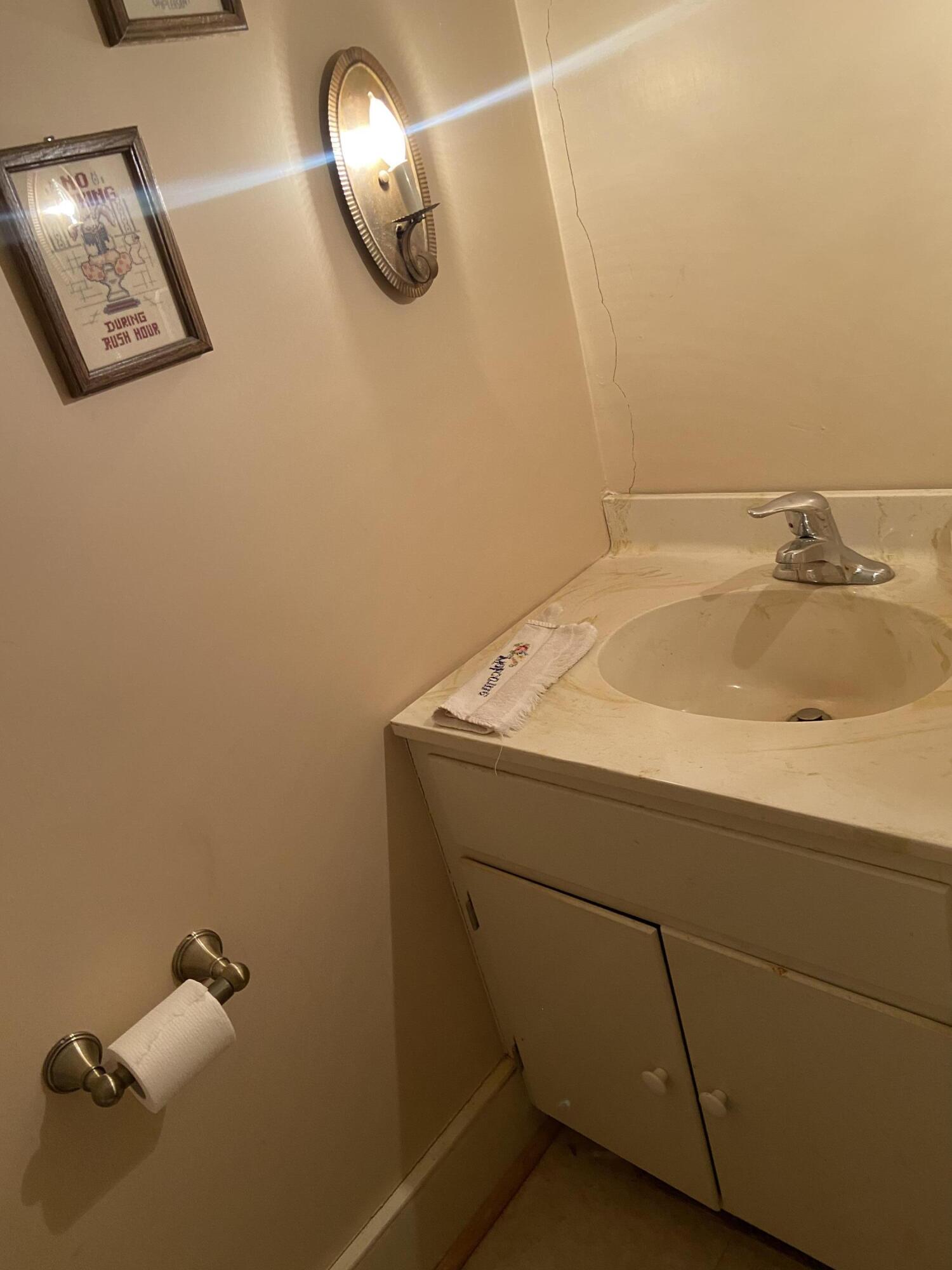 7229 Springwood Road Buchanan, VA 24066 - Photo 27 of 40 a bathroom with a sink and a mirror