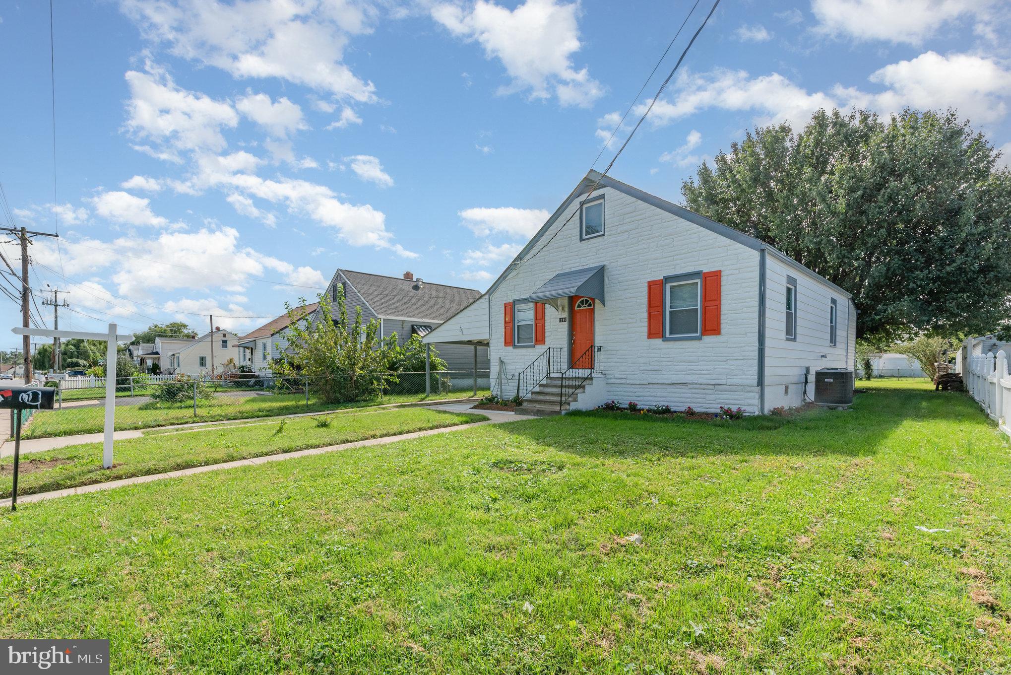 1205 North Point Road Dundalk, MD 21222 - Photo 2 of 19 a backyard of a house with table and chairs