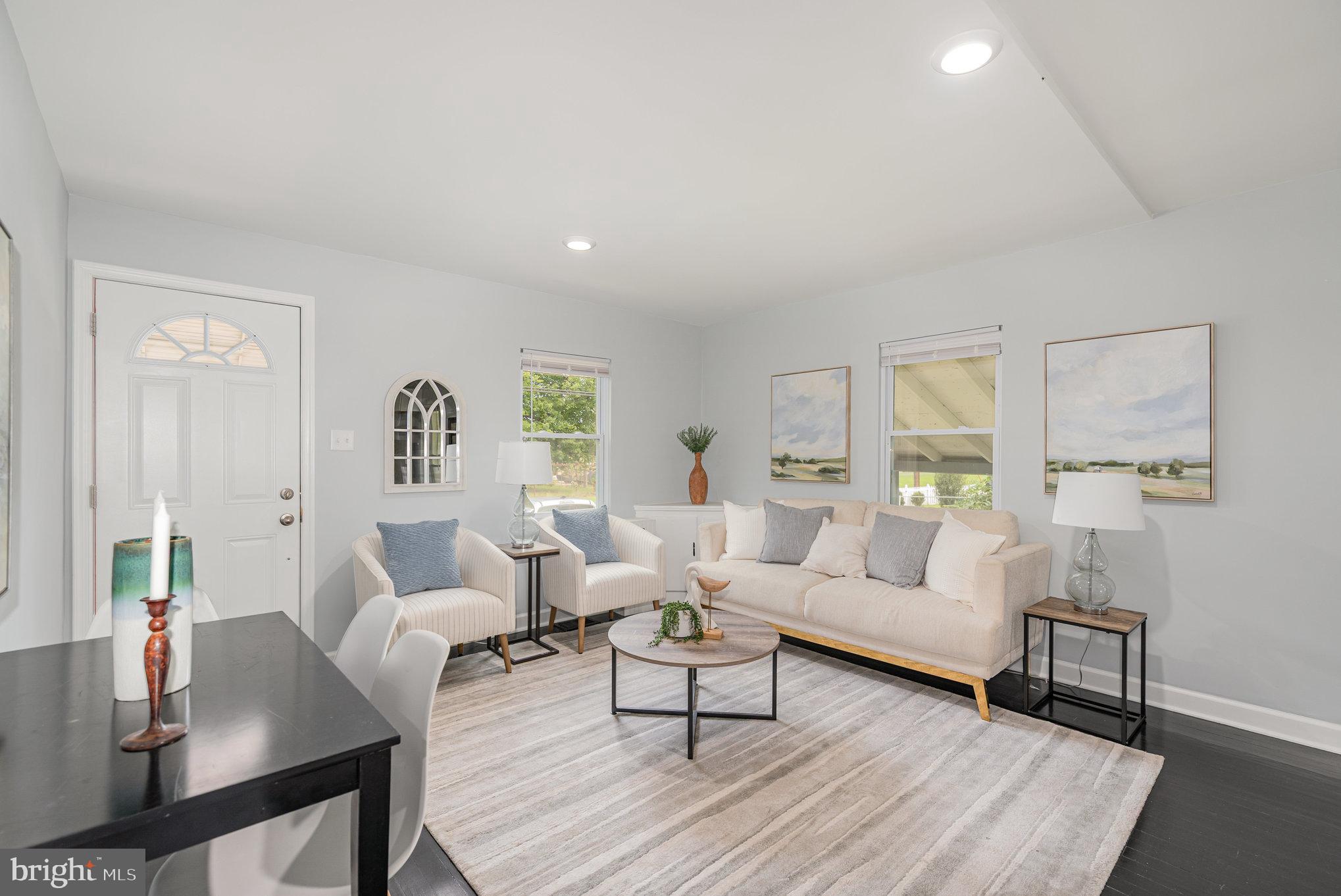 1205 North Point Road Dundalk, MD 21222 - Photo 3 of 19 a living room with furniture and wooden floor