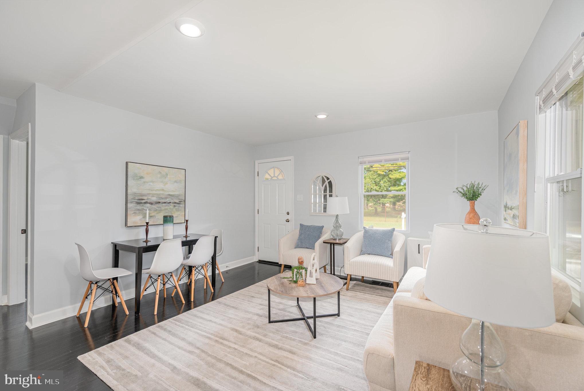 1205 North Point Road Dundalk, MD 21222 - Photo 9 of 19 a living room with furniture and wooden floor