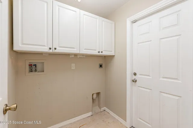 a view of bathroom with marble wall