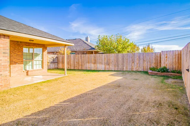 a view of swimming pool with outdoor seating