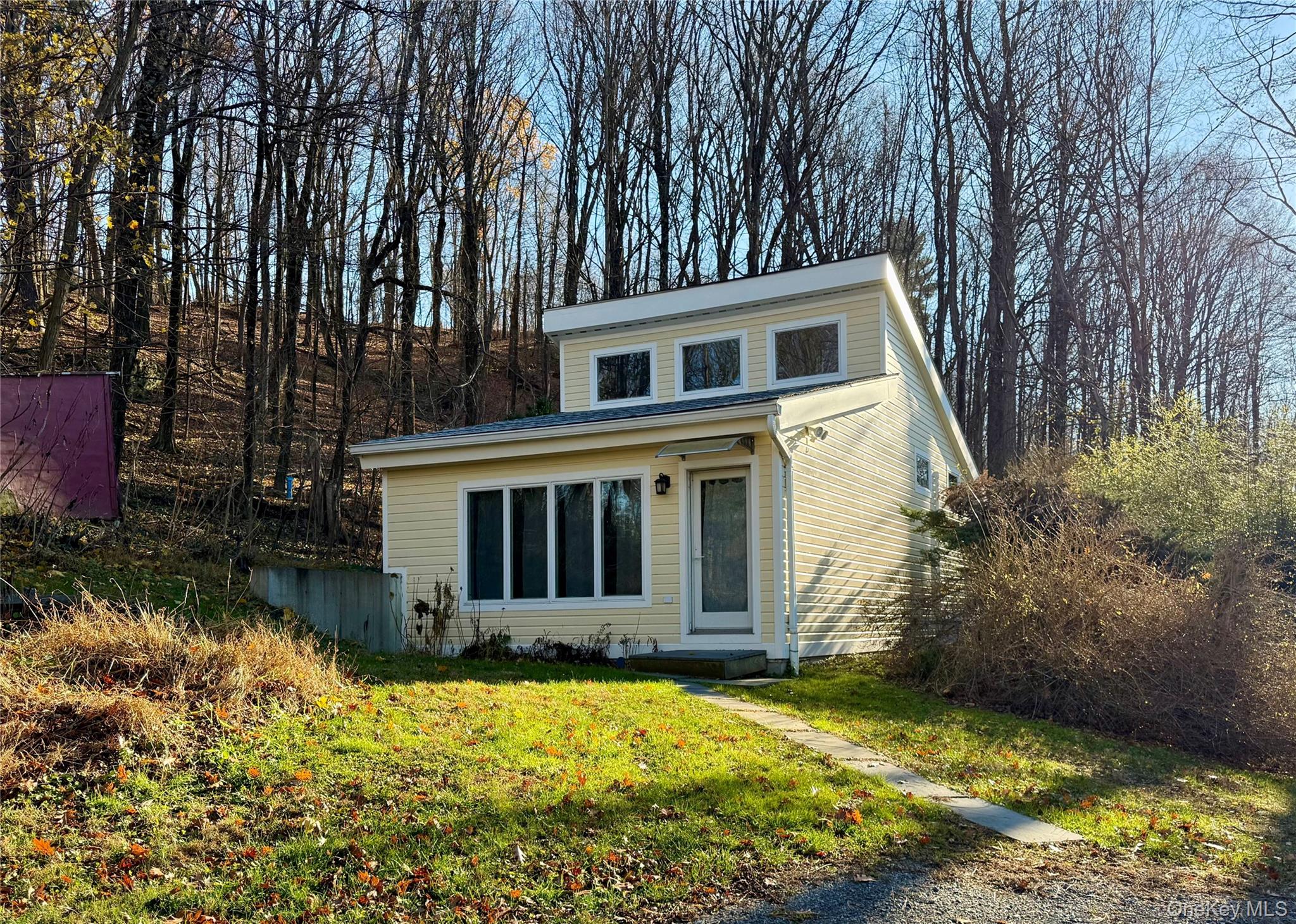 14 Spring Lake Road Red Hook, NY 12571 - Photo 1 of 6 a front view of a house with a yard