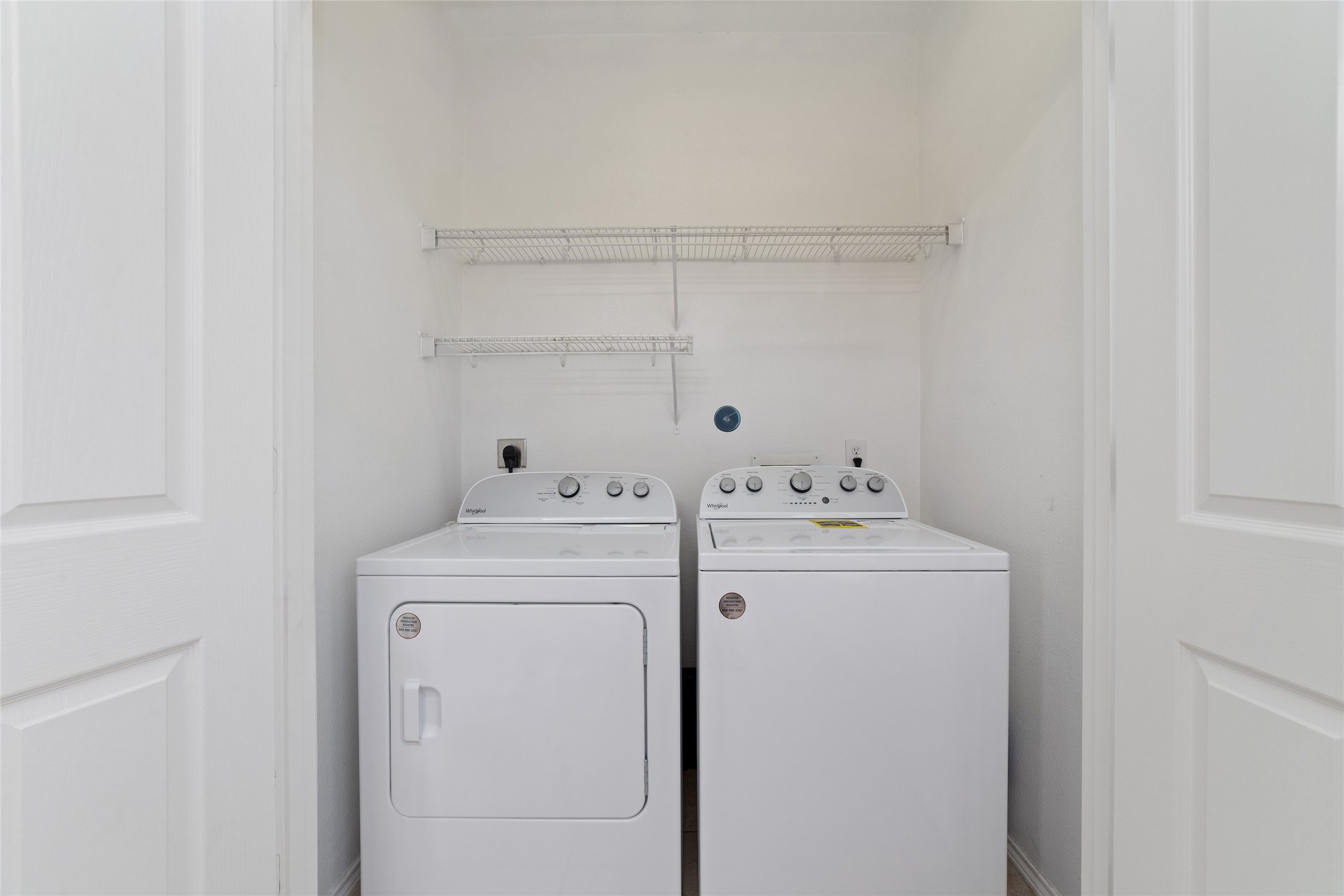 23602 Youpon Lake Lane Spring, TX 77373 - Photo 10 of 21 Laundry area with built-in shelving for added storage.