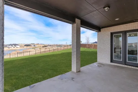 a view of a porch with a big yard