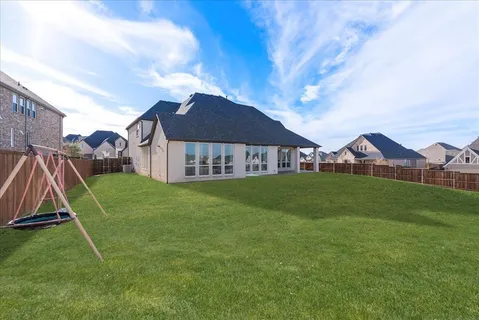 a view of a house with a big yard