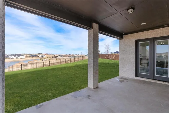 a view of a porch with a big yard