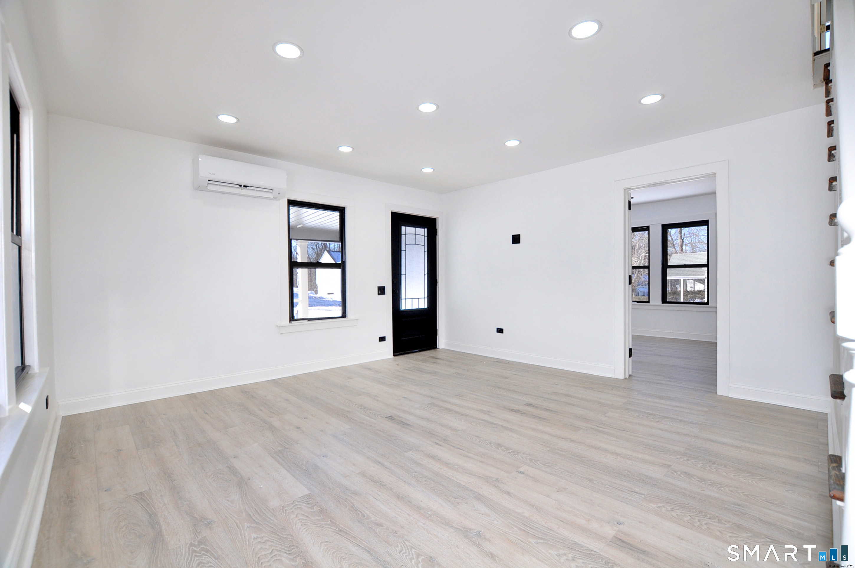 443 Todd Road Wolcott, CT 06716 - Photo 13 of 41 a view of an empty room with a window and fireplace