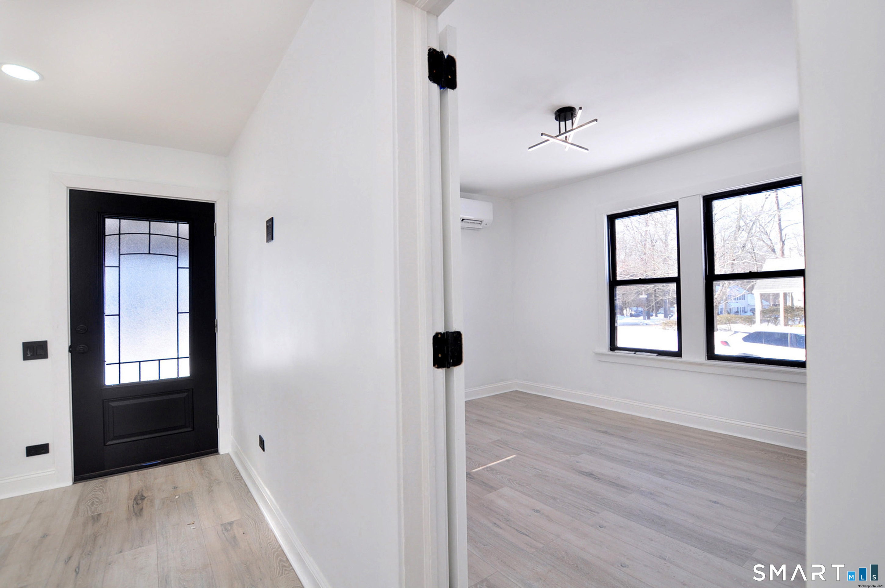 443 Todd Road Wolcott, CT 06716 - Photo 14 of 41 wooden floor in an empty room with a window
