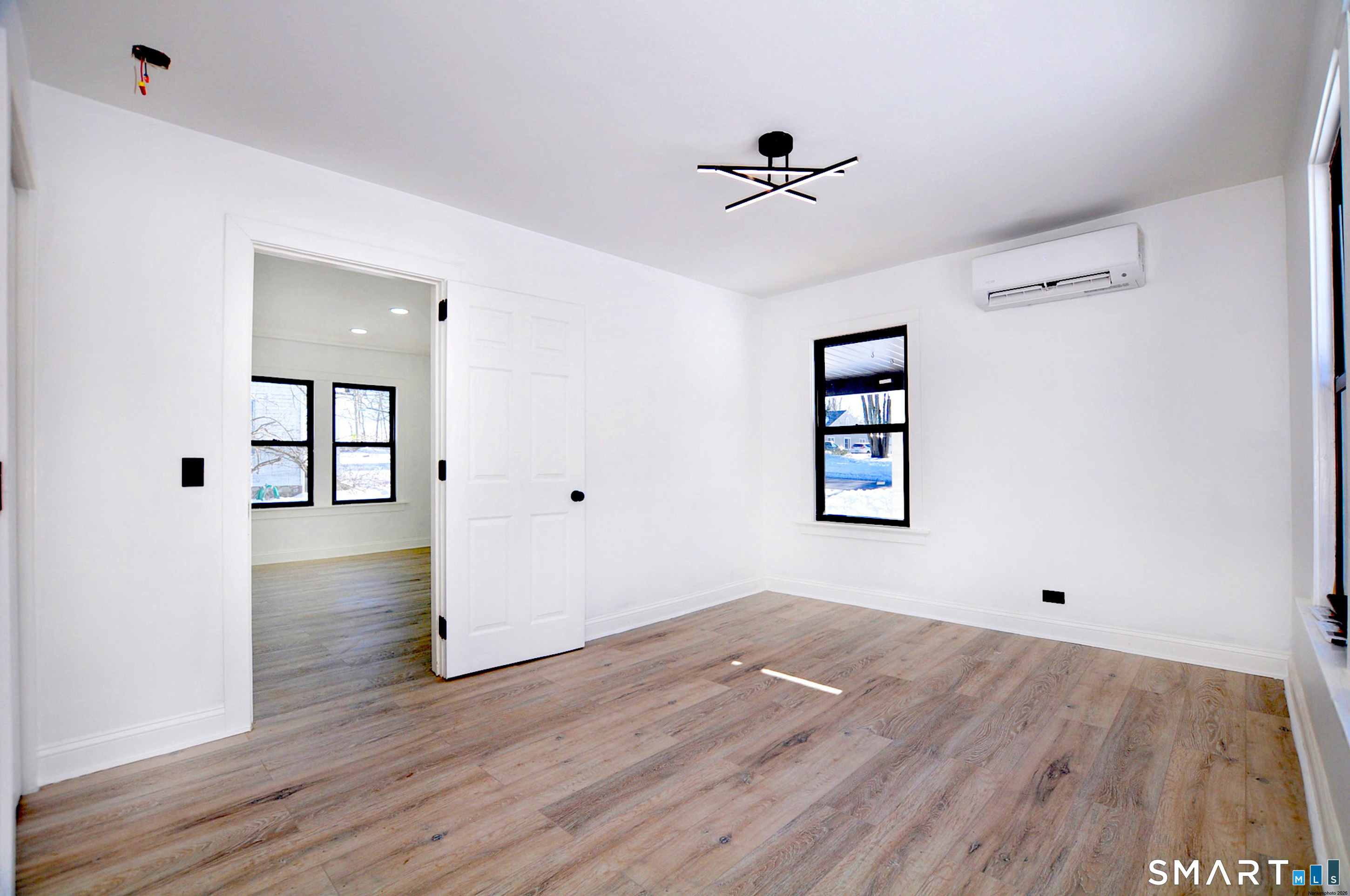 443 Todd Road Wolcott, CT 06716 - Photo 16 of 41 a view of empty room with wooden floor