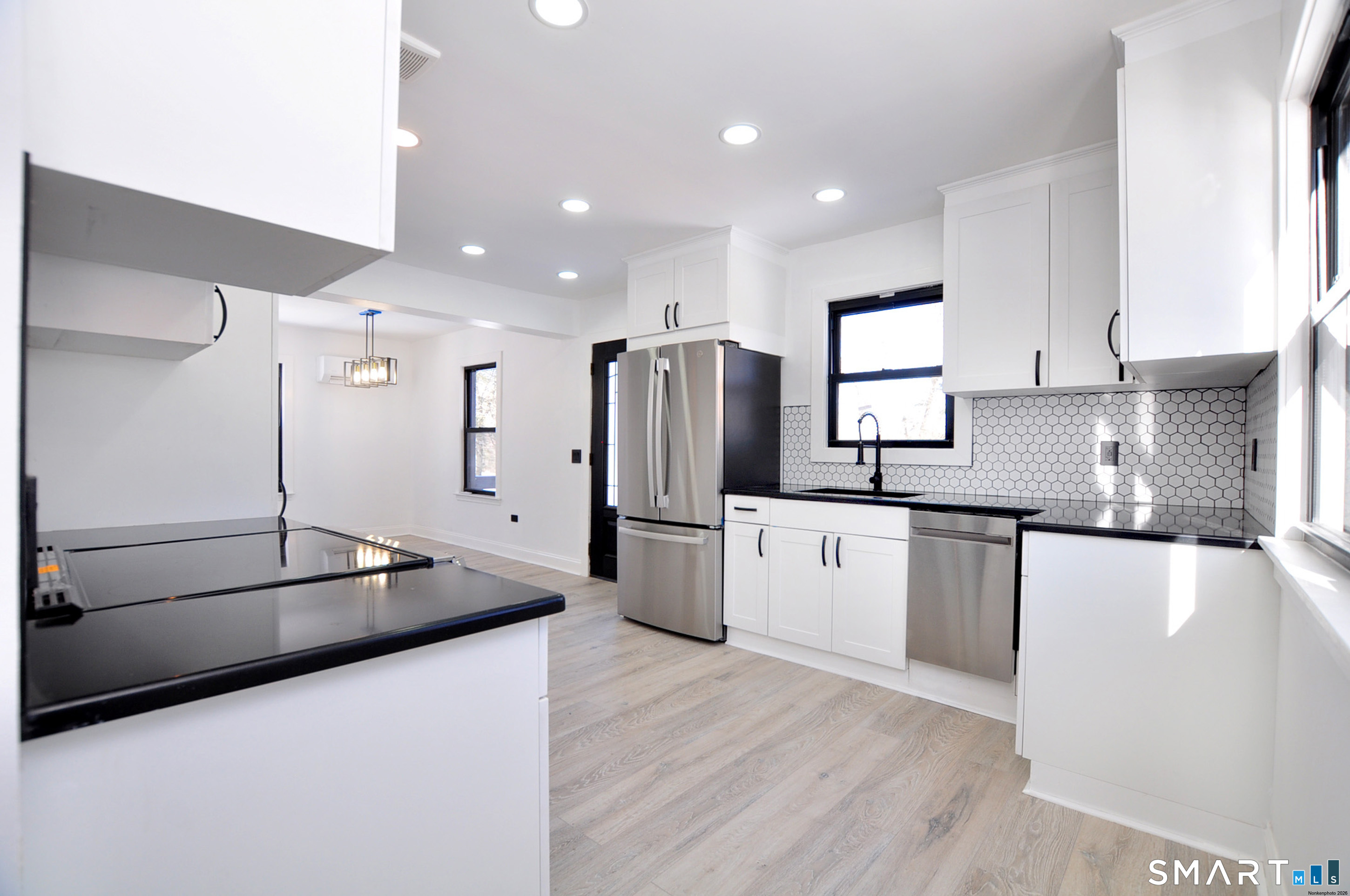 443 Todd Road Wolcott, CT 06716 - Photo 17 of 41 a kitchen with stainless steel appliances granite countertop a refrigerator and a sink
