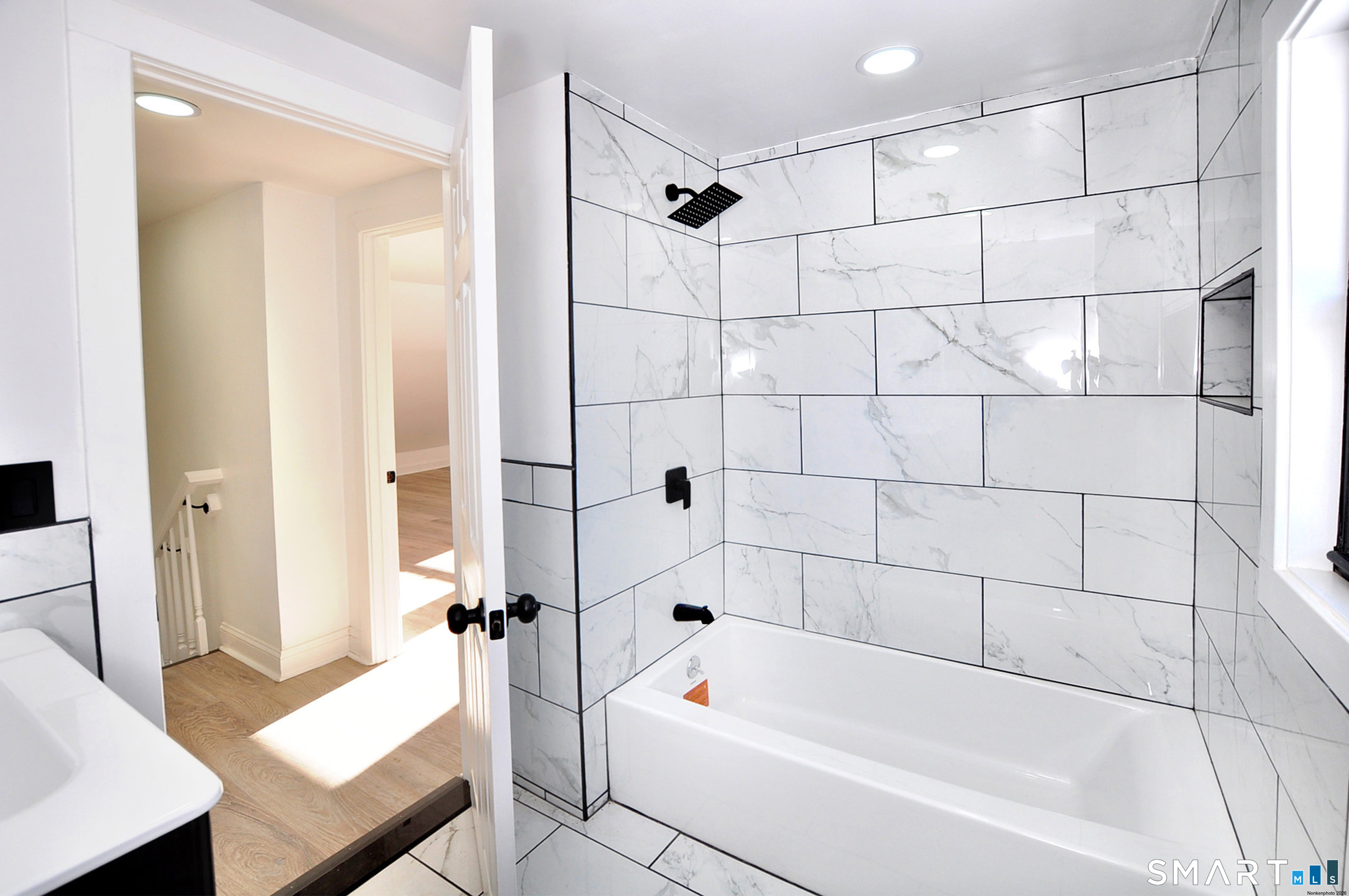 443 Todd Road Wolcott, CT 06716 - Photo 19 of 41 a bathroom with a tub a toilet and a shower