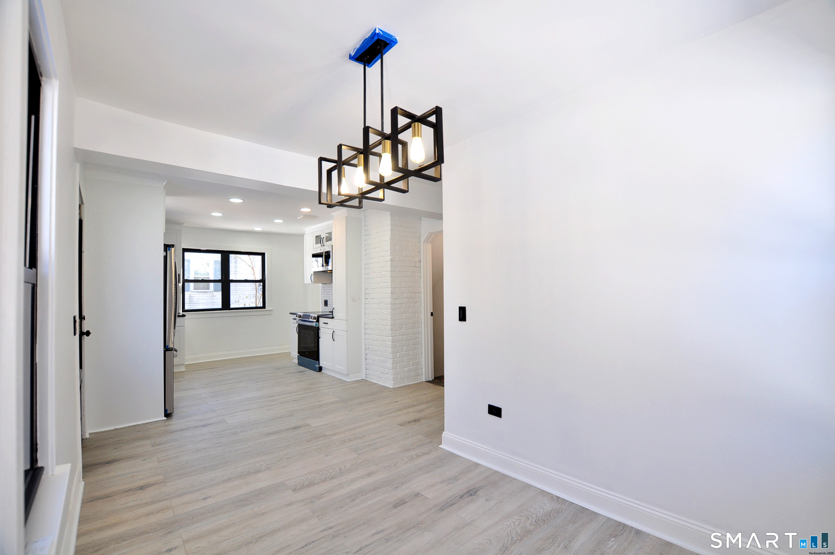 443 Todd Road Wolcott, CT 06716 - Photo 2 of 41 a view of a room with wooden floor and window