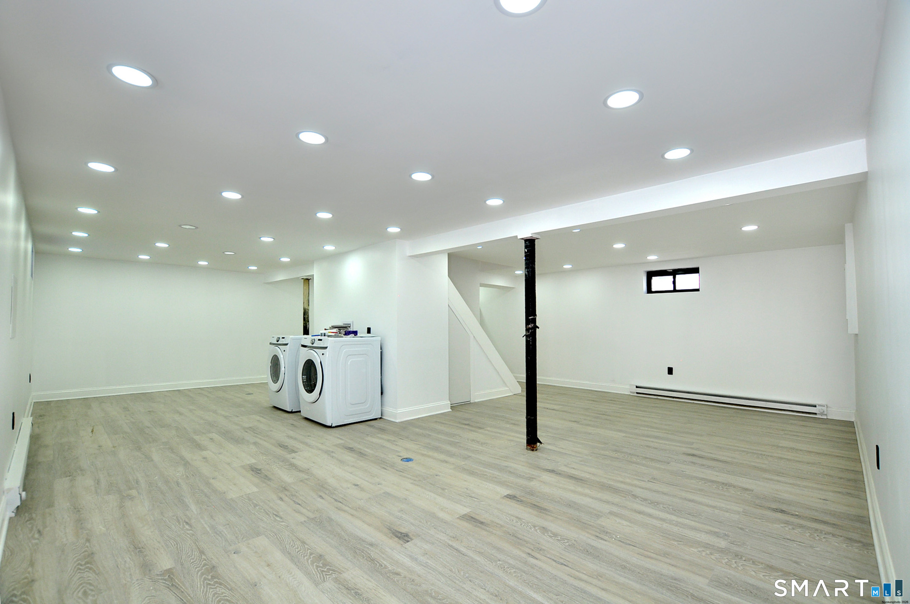443 Todd Road Wolcott, CT 06716 - Photo 38 of 41 a view of an empty room with wooden floor and windows