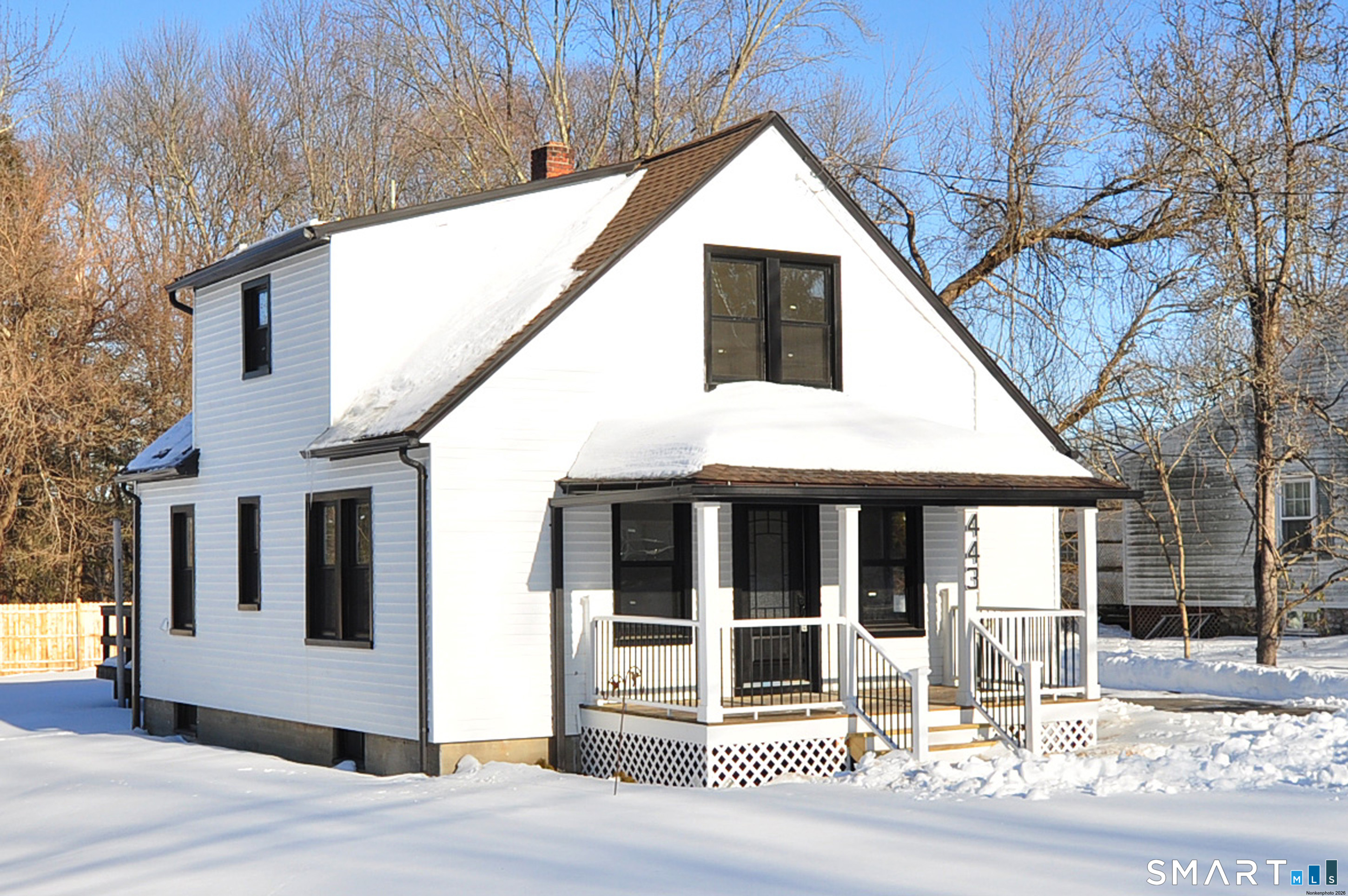 443 Todd Road Wolcott, CT 06716 - Photo 9 of 41 a view of a white house with large windows