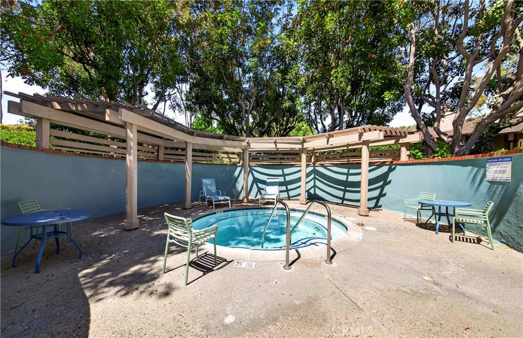 9 Madrona Irvine, CA 92612 - Photo 36 of 38 a patio with table and chairs
