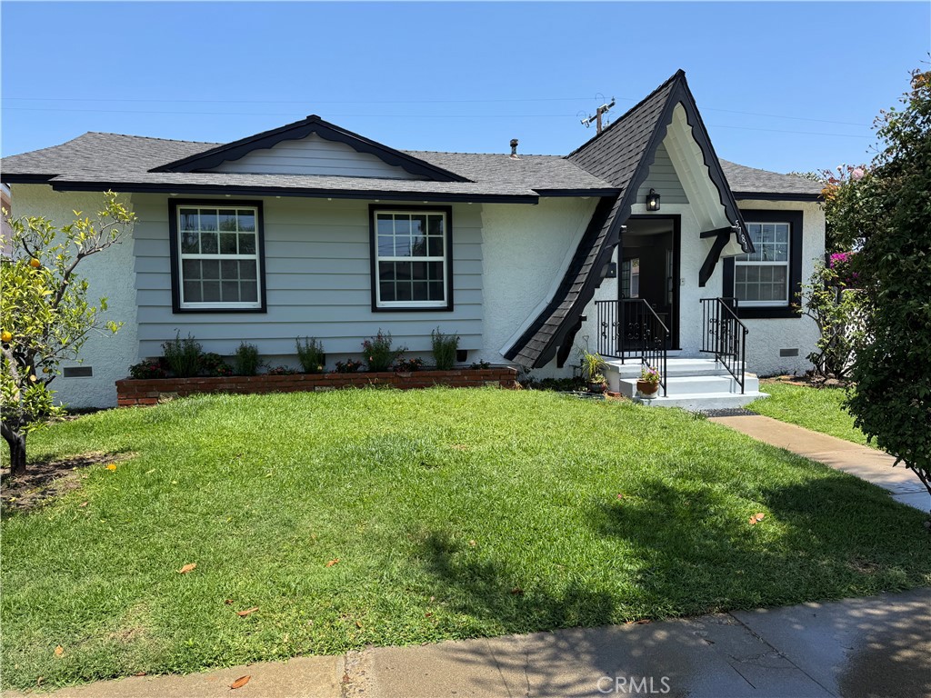 5781 Lime Avenue Cypress, CA 90630 - Photo 2 of 40 a front view of a house with a yard