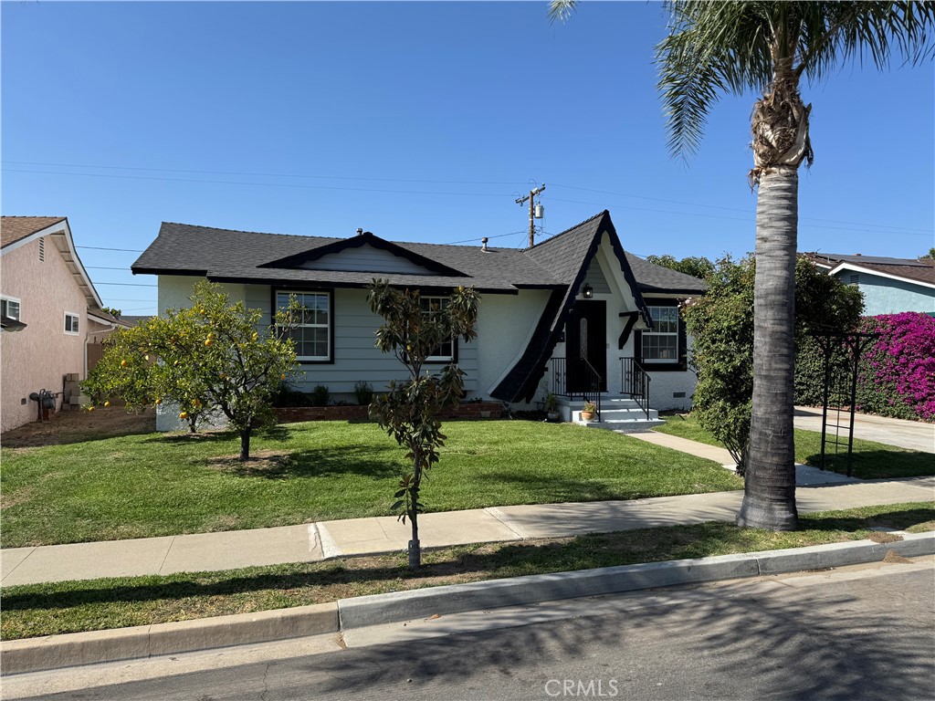 5781 Lime Avenue Cypress, CA 90630 - Photo 3 of 40 a front view of a house with a yard