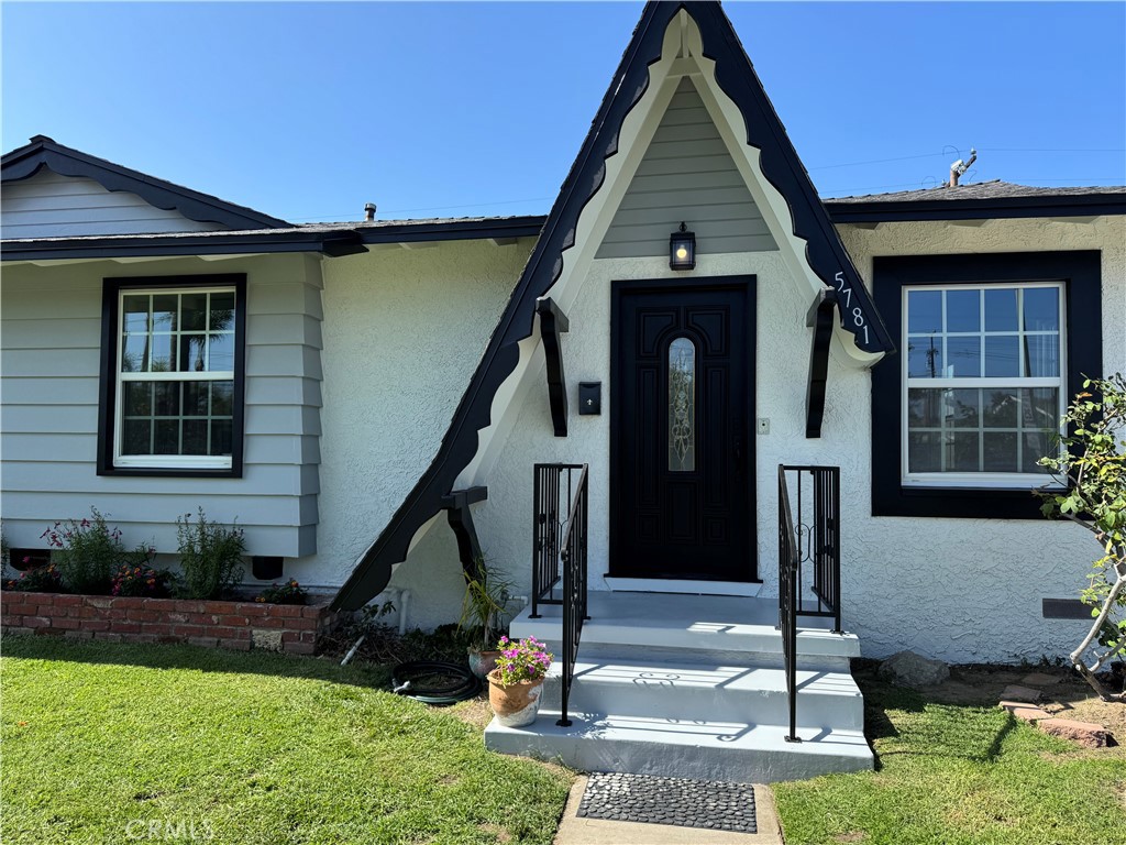 5781 Lime Avenue Cypress, CA 90630 - Photo 40 of 40 a front view of a house with a yard