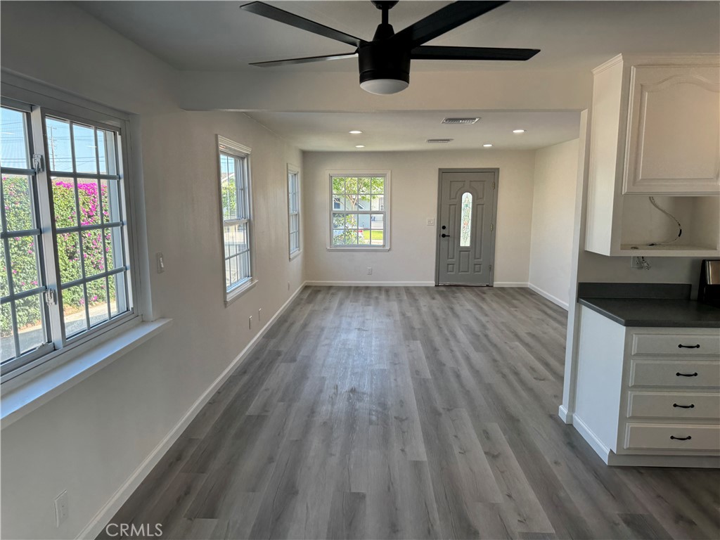 5781 Lime Avenue Cypress, CA 90630 - Photo 7 of 40 wooden floor in an empty room with a window