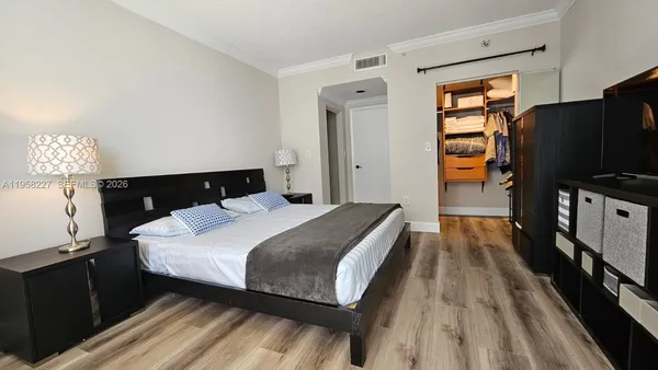 a view of a dining room with furniture and window