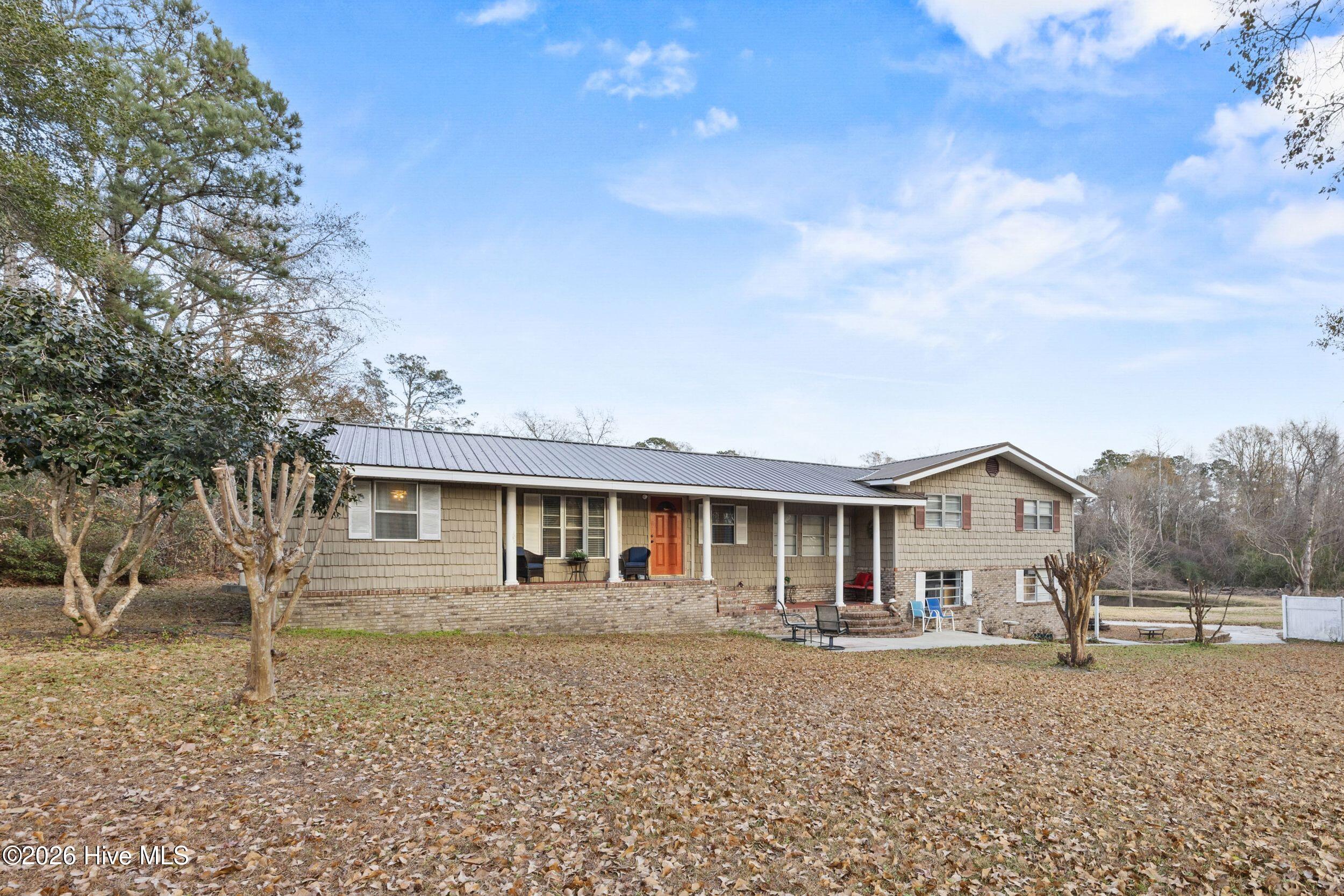 1460 Midway Road Southeast Bolivia, NC 28422 - Photo 2 of 23 2_front exterior