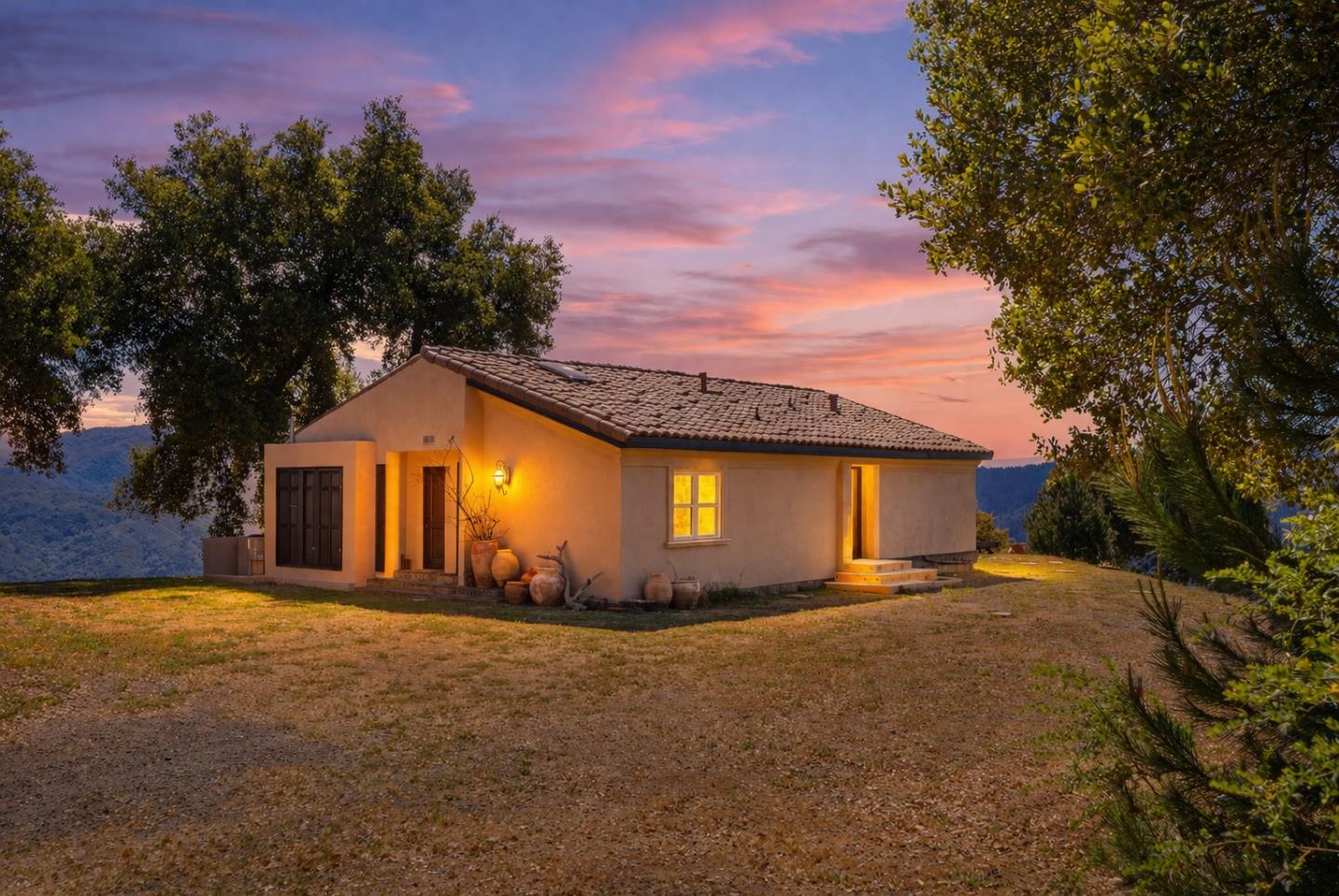 19375 Montevina Road Los Gatos, CA 95033 - Photo 2 of 36 a front view of a house with a yard and garage