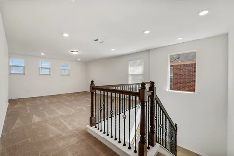 a view of hallway with stairs