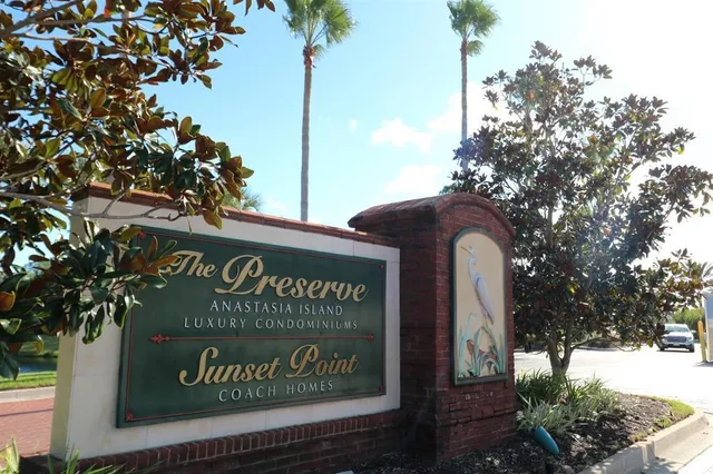 a view of a lake with a yard