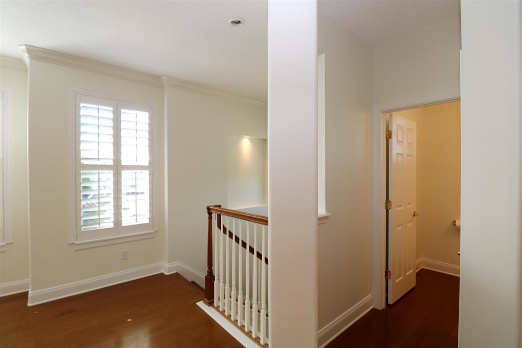 207 Sunset Point St. Augustine, FL 32080 - Photo 24 of 59 a view of a room with a window and wooden floor