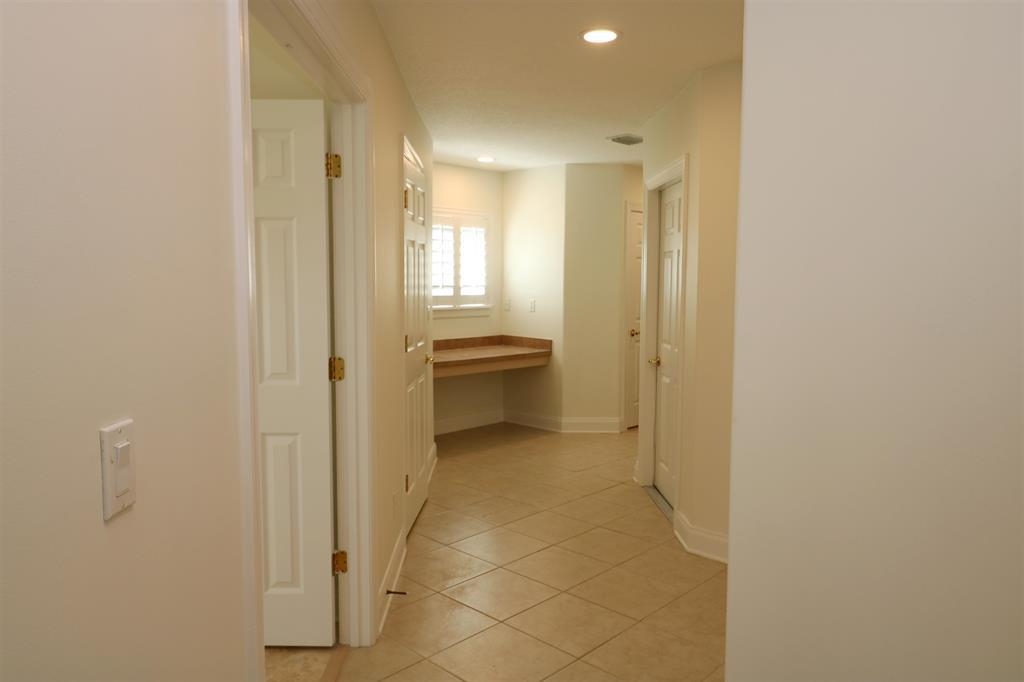 207 Sunset Point St. Augustine, FL 32080 - Photo 48 of 59 a bathroom with a glass shower door