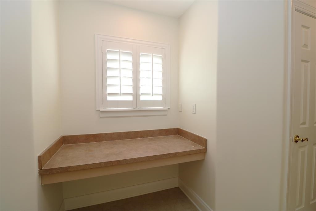 207 Sunset Point St. Augustine, FL 32080 - Photo 51 of 59 a bathroom with a sink and a window