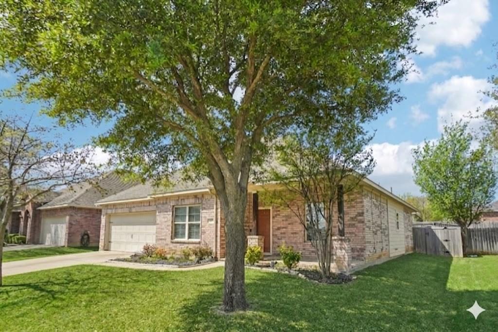 308 Sheridan Road Oak Point, TX 75068 - Photo 1 of 1 front view of a house with a yard