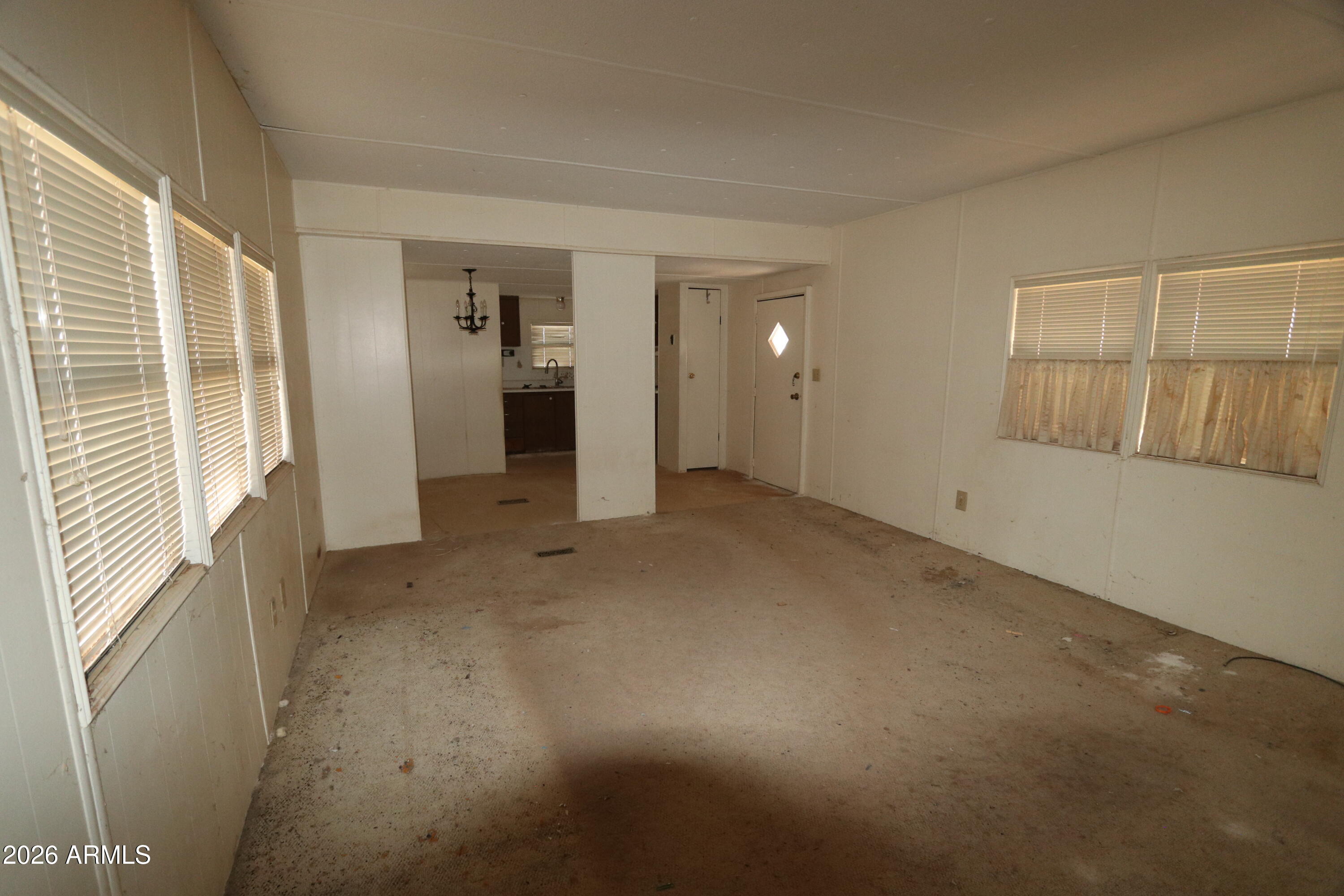 6286 East Mockingbird Road, Unit 8 Pearce, AZ 85625 - Photo 19 of 28 an empty room with windows